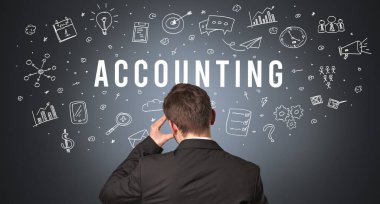 Muhasebe yazıtları, modern iş konsepti olan bir iş adamının arka görünüşü