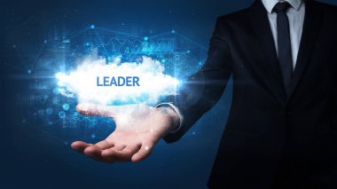 İş adamının eli Lider 'in el yazısı, başarılı iş konsepti