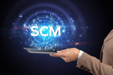 SCM kısaltmalı bir dokunmatik ekran, modern teknoloji konsepti