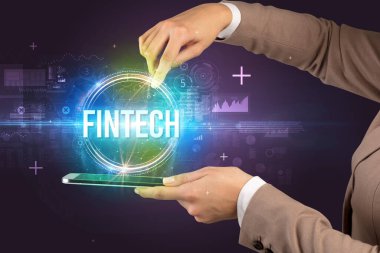 FINTECH yazıtları ve yeni teknoloji konseptiyle dokunmatik ekranın yakın plan görüntüsü