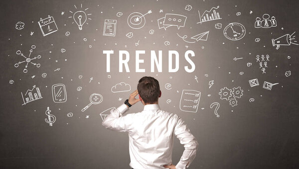 Rear view of a businessman with TRENDS inscription, modern business concept