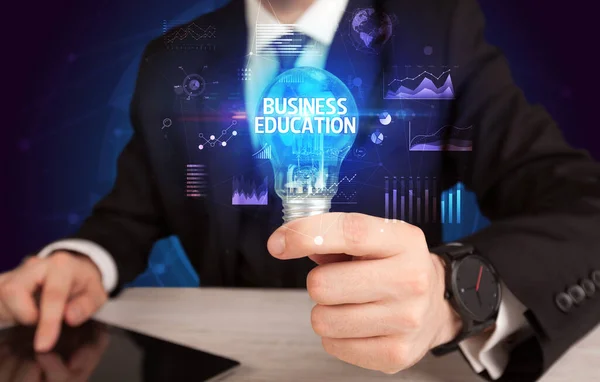 Podnikatel Držící Žárovku Nápisem Business Education Business Idea Koncept — Stock fotografie