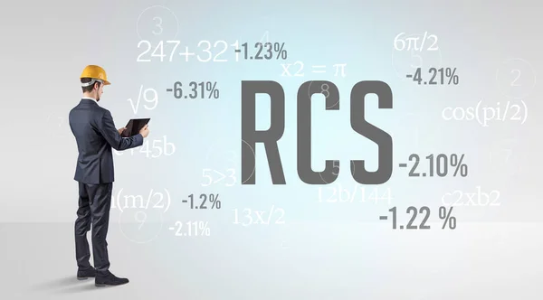 Technology Engineer in hard hat with RCS abbreviation