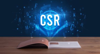 Açık bir kitaptan çıkan Csr yazıt, dijital teknoloji konsepti