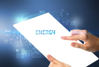 El işi fütüristik tablet içinde ENERGY yazıtları, yeni teknoloji kavramı