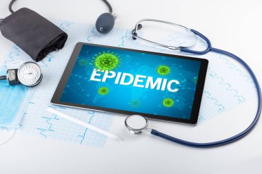 EPIDEMIC yazıtı, mikrobiyoloji kavramına sahip bir tabletin yakın görüntüsü