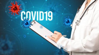 Doktor COVID19 yazıtlı reçete yazıyor, salgın konsepti.