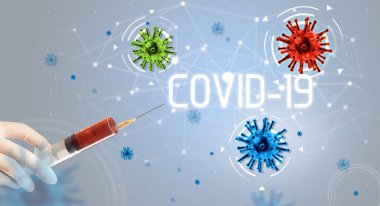 Şırınga, elinde COVID-19 yazısıyla tıbbi enjeksiyon, koronavirüs aşısı konsepti.