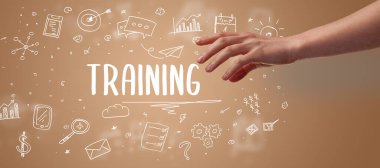 Kesilmiş ellerin yakın çekimi eğitim yazıtlarına işaret ediyor, modern iş çözümleri kavramı