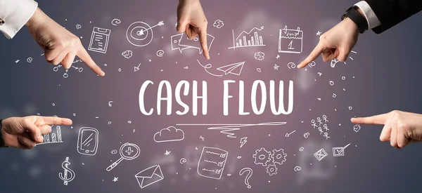 Close-Up of cropped hand pointing at CASH FLOW inscription, modern business solution concept