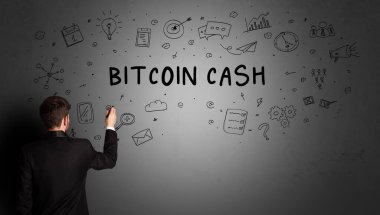 İş adamı Bitcoin Cash yazıtları ve iş stratejisi konseptiyle yaratıcı bir fikir taslağı çiziyor.