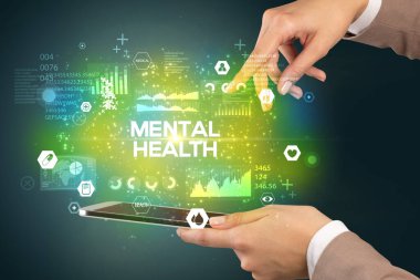 MENTAL Sağlık Yazıtları ve Tıbbi Konsept içeren bir dokunmatik ekran yakın plan