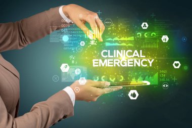 CLINICAL EMERGENCY yazıt, tıbbi konsept ile bir dokunmatik ekran yakın çekim