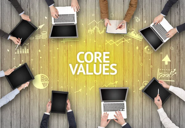 Group of Busy People Working in an Office with CORE VALUES inscription, succesfull business concept