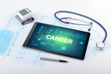 CANCER yazıtlı tablet bilgisayar ve tıbbi malzeme, önleme kavramı