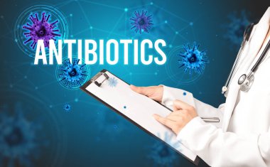 Doktor, AnTIBIOTICS yazıtları ve salgın konseptiyle reçete yazıyor.