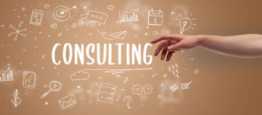 Kesilmiş ellerin yakın çekimi CONSULTING yazıt, modern iş çözümü kavramı