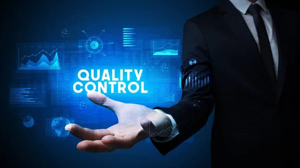 Hand Businessman Holding Quality Control Inscription Business Success Concept — Stock fotografie
