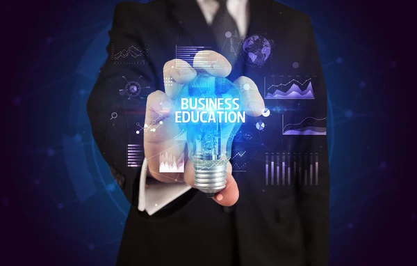 Бізнесмен Тримає Лампочку Написом Business Education Концепція Бізнес Ідеї — стокове фото