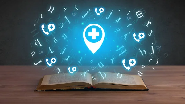 Open medical book with hospital location icons above, global health concept