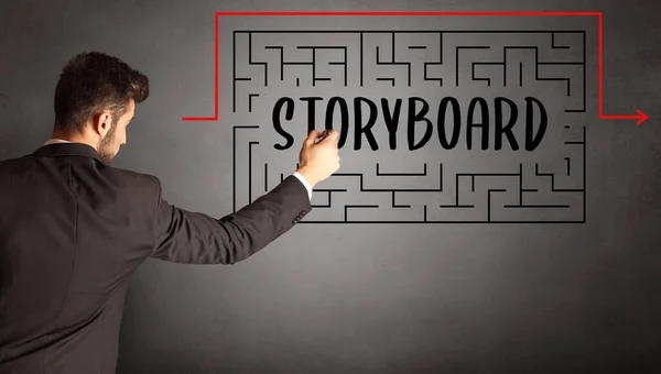 Hombre Negocios Dibujo Laberinto Con Inscripción Storyboard Concepto Educación Empresarial — Foto de Stock