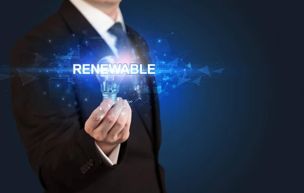 Zakenman Met Gloeilamp Met Renewable Inscriptie Innovatief Technologieconcept — Stockfoto