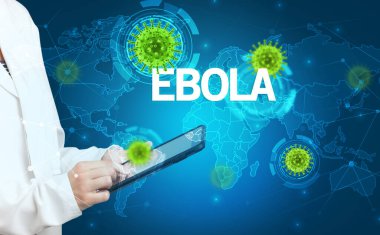 Doktor EBOLA yazıtları ve viroloji konseptiyle tıbbi kayıtları dolduruyor.