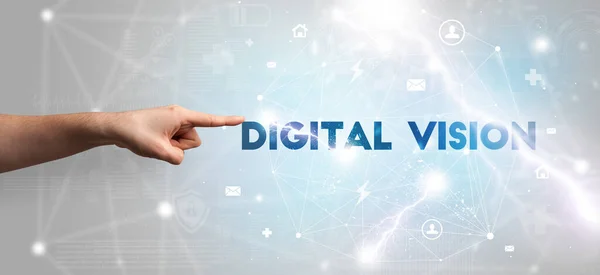 Hand pointing at DIGITAL VISION inscription, modern technology concept