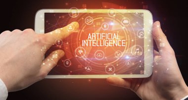 ARTIFICIAL INTELLIGENCE yazıtlı, yenilikçi teknoloji kavramına sahip bir tabletin yakın çekimi