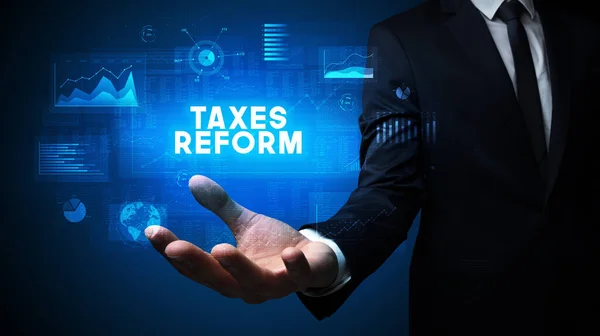 Hand Businessman Holding Taxes Reform Inscription Business Success Concept — Stock fotografie