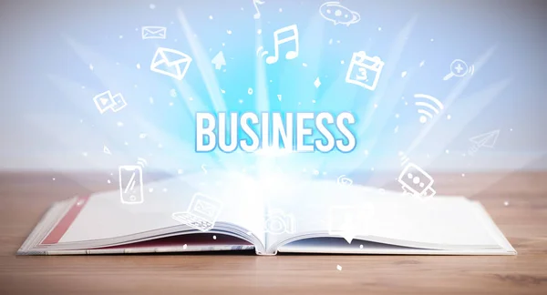 Opeen book with BUSINESS inscription, business concept