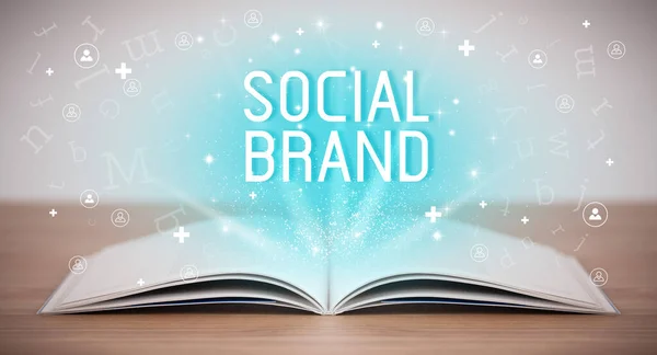 Open book with SOCIAL BRAND inscription, social media concept