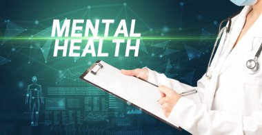 Doktor panoya MENTAL Sağlık yazısını, tıbbi tanı kavramını içeren notlar yazar.