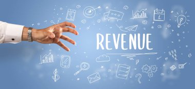 Kırpılmış ellerin yakın çekimi REVENUE yazıtına işaret ediyor, modern iş çözümleri kavramı