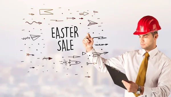 Knappe Zakenman Met Helm Tekening Easter Sale Inscriptie Constructie Verkoop — Stockfoto
