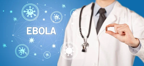 Arts Geven Pil Met Ebola Inscriptie Coronavirus Concept — Stockfoto