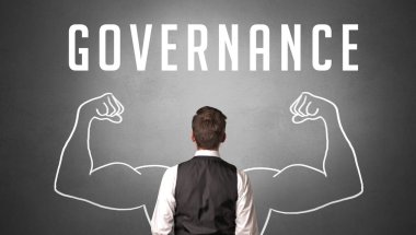 GOVERNANCE yazıtları, güçlü iş konsepti olan bir işadamının arka görünümü
