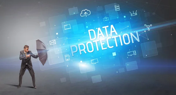 Biznesmen Broniący Się Parasolem Przed Atakiem Cybernetycznym Napisem Data Protection — Zdjęcie stockowe