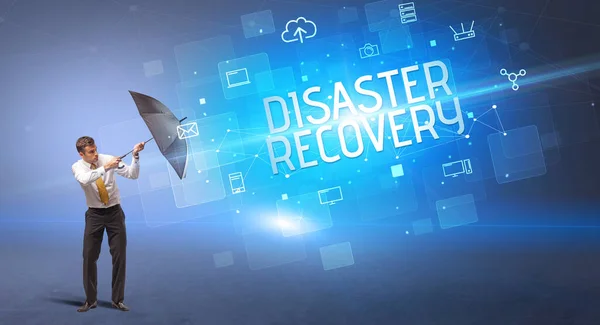 Affärsman Som Försvarar Med Paraply Från Cyberattack Och Disaster Recovery — Stockfoto
