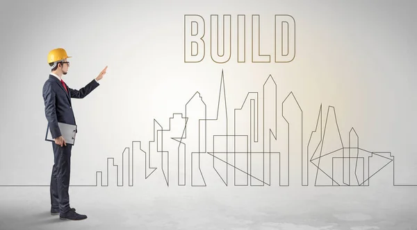 Biznesmen Twardym Kapeluszu Trzymający Projekt Napisem Build Inżynierii Koncepcji Architektury — Zdjęcie stockowe