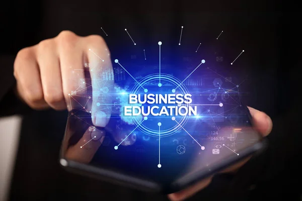 Biznesmen Posiadający Składany Smartfon Napisem Business Education Nowa Koncepcja Biznesowa — Zdjęcie stockowe