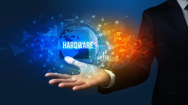 Elegant hand holding HARDWARE inscription, digital technology concept