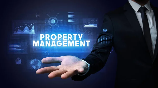 Hand Businessman Holding Property Management Inscription Business Success Concept — Stock fotografie