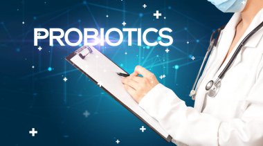 Doktor tıbbî kayıtları PROBIOTICS yazıtları ve tıbbi konseptle dolduruyor.