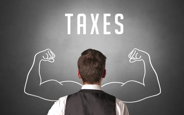 Vista Trasera Hombre Negocios Con Inscripción Taxes Poderoso Concepto Negocio —  Fotos de Stock