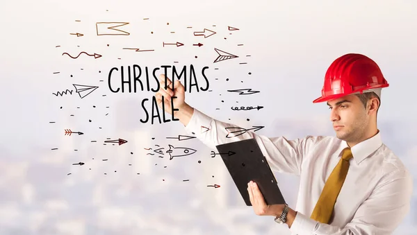 Knappe Zakenman Met Helm Tekening Christmas Sale Inscriptie Constructie Verkoop — Stockfoto