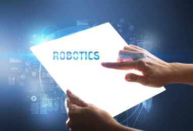 ROBOTICS yazıtlı el yapımı fütüristik tablet, yeni teknoloji kavramı