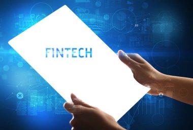 FINTECH yazıtlı el yapımı fütüristik tablet, yeni teknoloji kavramı