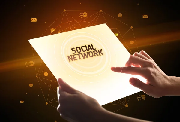 Het Houden Van Futuristische Tablet Met Social Network Inscriptie Social — Stockfoto