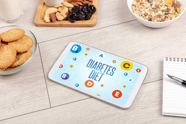 Healthy Tablet Pc compostion with DIABETES DIET inscription, weight loss concept